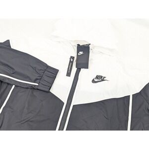 Nike Windrunner Jacket Hooded Womans 2X Black White Vented Outdoor Windbreaker